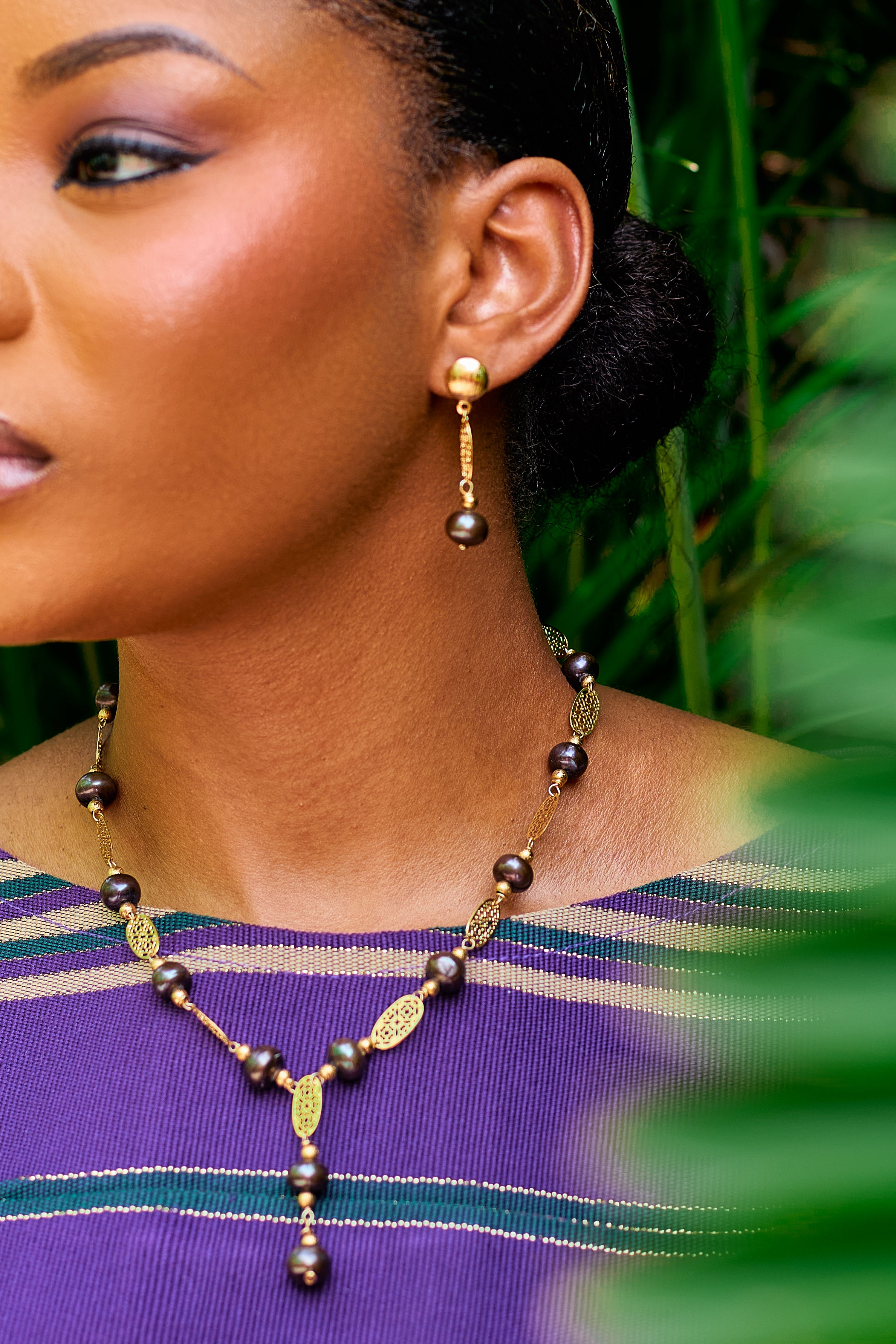 Agbèké bespoke traditional coral and precious gemstone bridal necklace and earring set handcrafted in Lagos by Jewellery Banc.