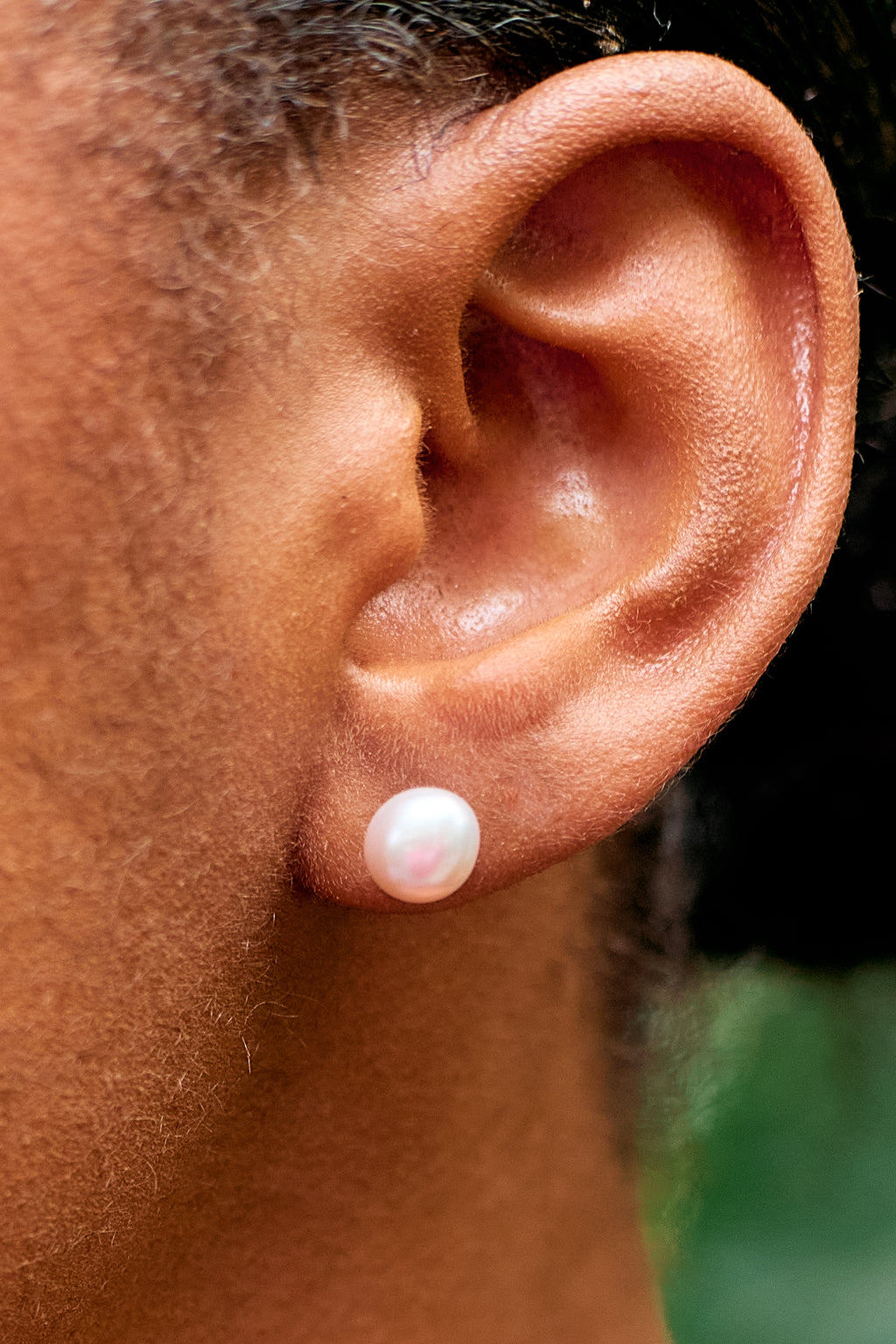 Ifé Kini minimalist button earrings crafted with polished authentic Mediterranean coral beads and gold mountings by Jewellery Banc.
